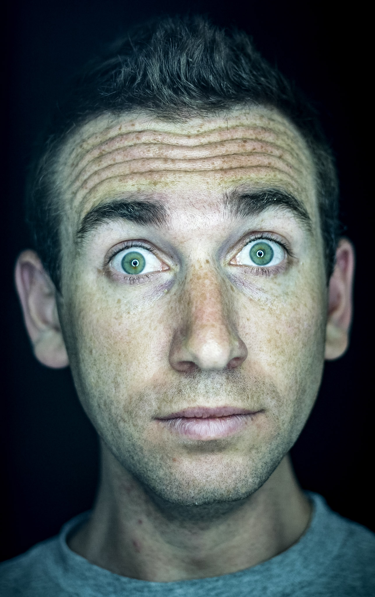 Close portrait of a wide-eyed man