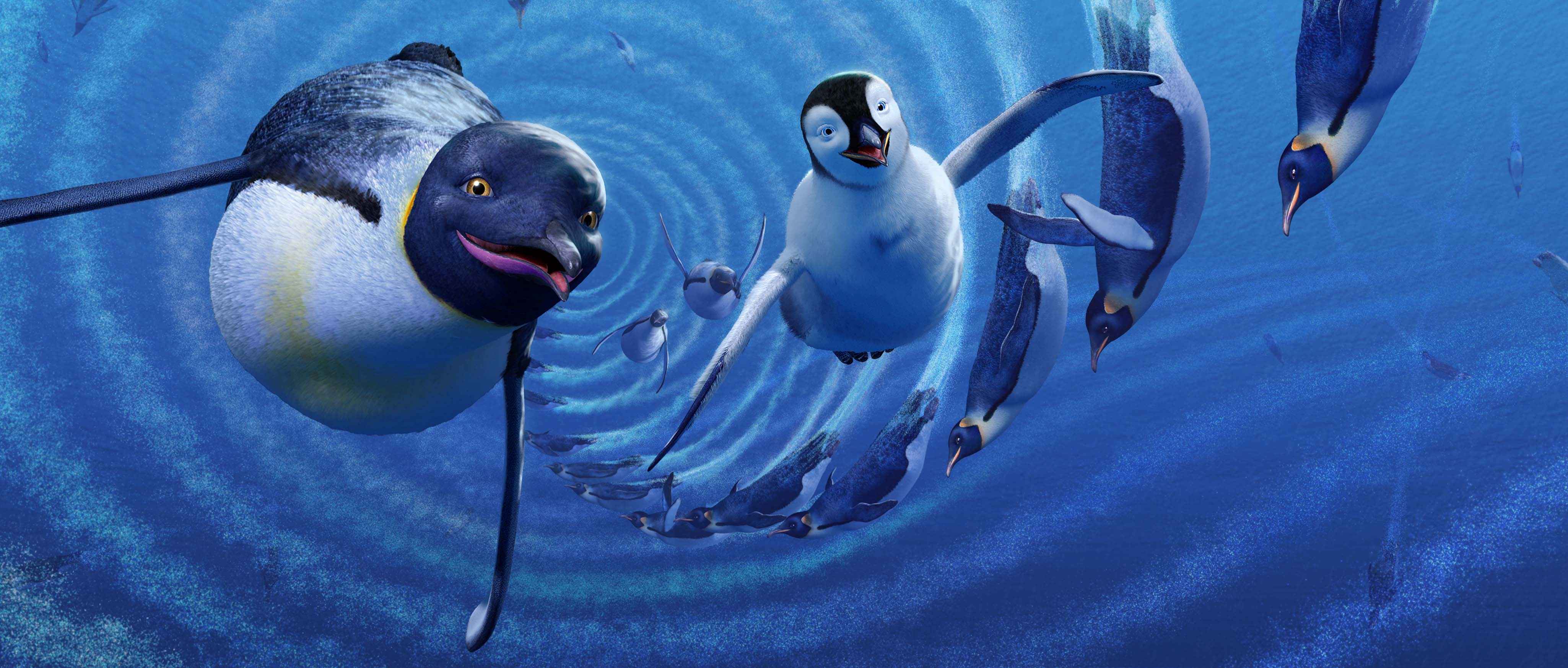 Emperor penguins swimming in Happy Feet